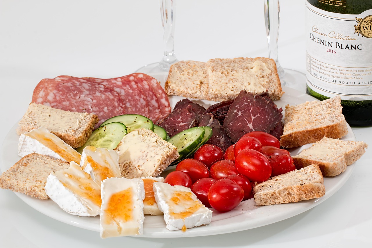 hors doeuvre, starters, appetizers, charcuterie, delicatessen, food platter, catering, cheese, salami, smoked beef, tomato, snack, bread, plate, cuisine, protein, antipasto, meat, tasty, platter, assortment, appetite, finger food, buffet, canapes, nourishment, nutrition, protein, protein, protein, protein, protein